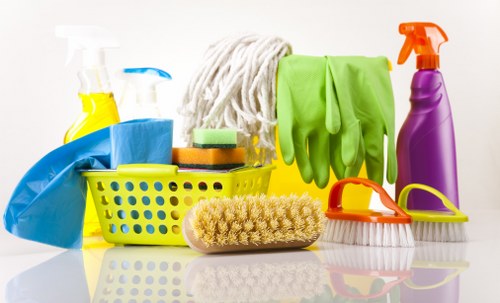 Technician preparing carpet cleaning equipment with safety focus