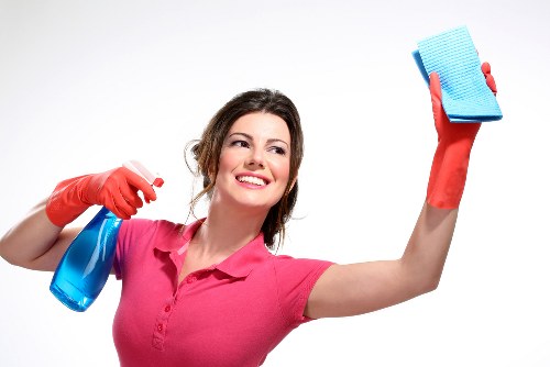 Service records being checked during a carpet cleaning complaint investigation